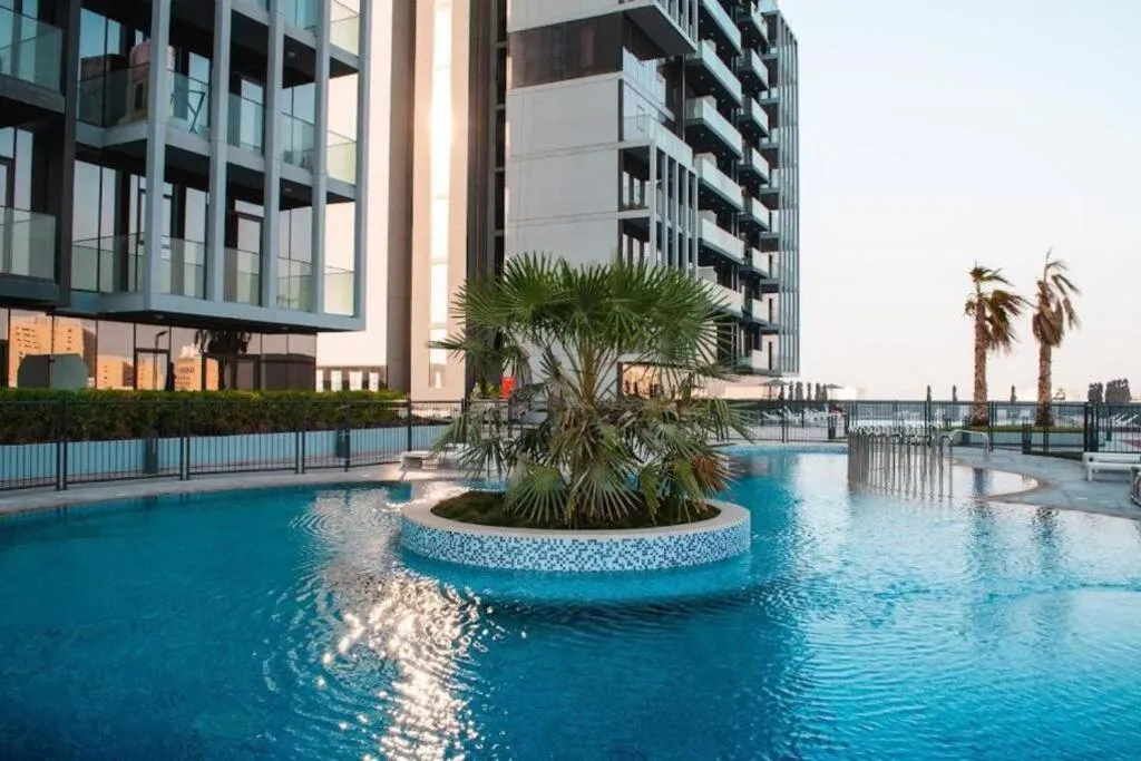 Image 2 of Bloom Studio in JVC – King Bed, Massive Pools, Indoor Parking